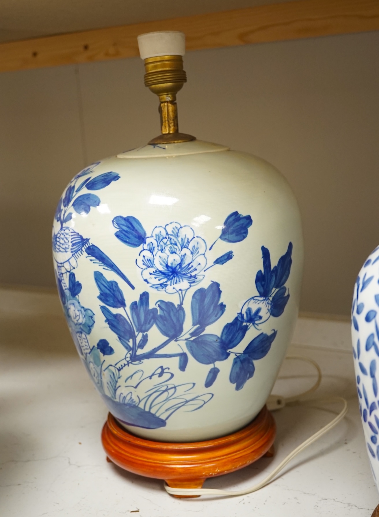 Two Chinese porcelain jars mounted as lamps and a similar blue and white octagonal jardiniere, largest 35cm wide. Condition - good (3)